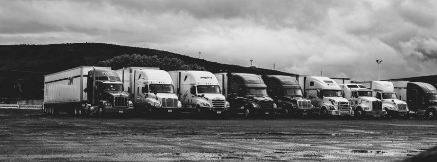 Line of trucks black and white